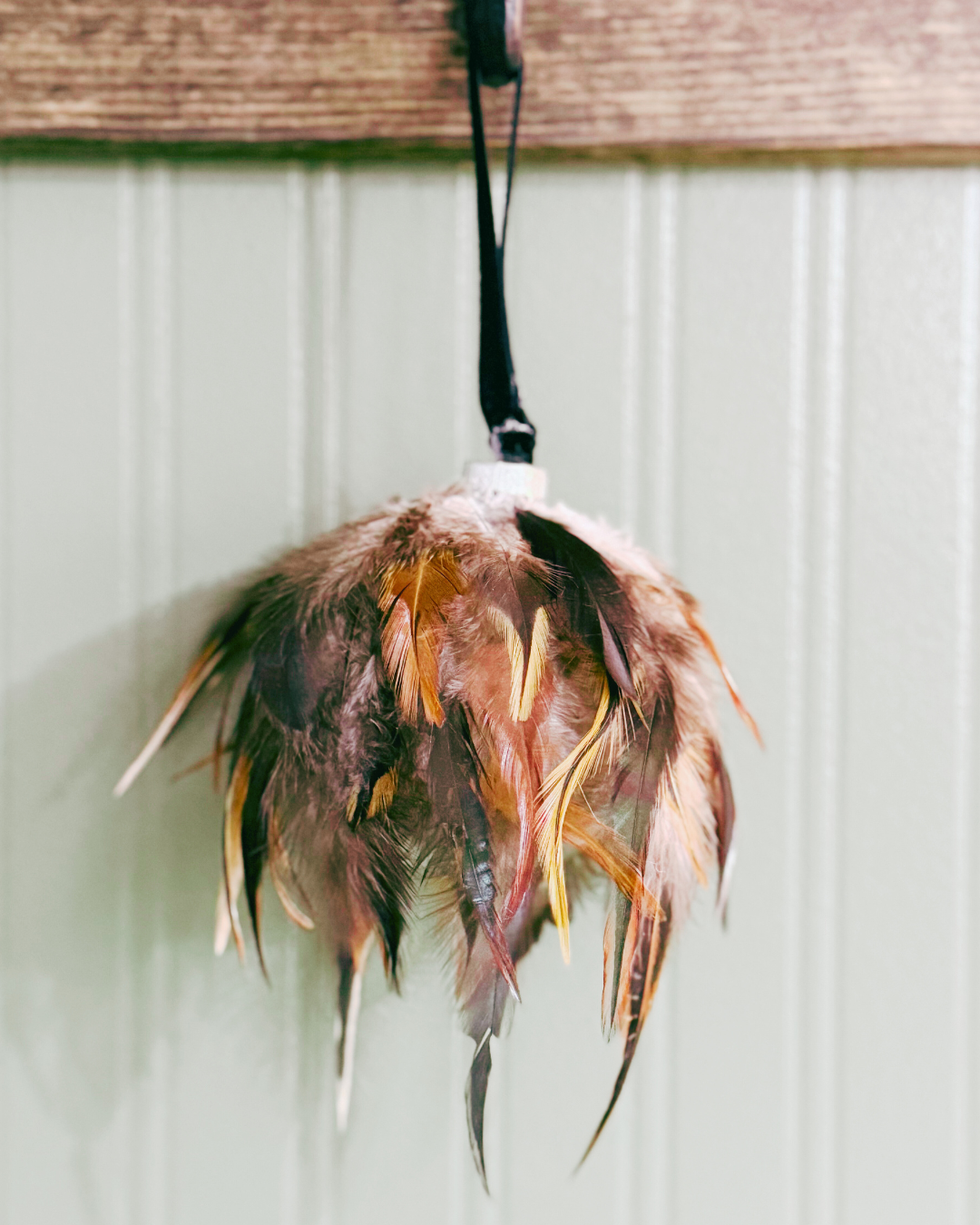 Black Saddle Hackle Feather Ornament with Velvet Ribbon
